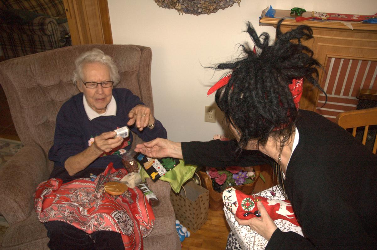 Mam and Debra opening presents